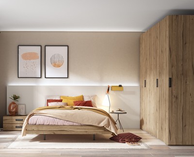 Schlafzimmer mit Doppelbett, Kopfteil, Nachttischen, Kleiderschrank und Schreibtisch